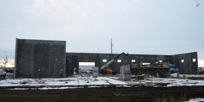 A structure going up near the intersection of Main Avenue and 42nd Street south in Fargo will be an automotive collision center. Dave Olson/The Forum